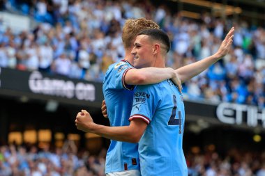 Kevin De Bruyne #17 of Manchester City celebrates with Phil Foden #47 of Manchester City after scoring to make it 2-0