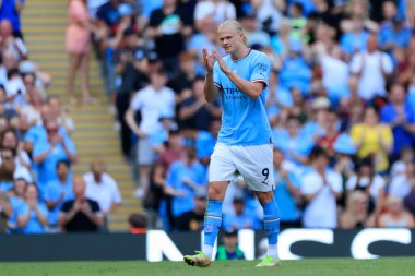 Erling Haaland #9 of Manchester City  applauds the fans as he is substituted in the 74th minute