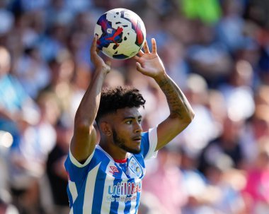 Kaine Kesler-Hayden #15 of Huddersfield Town sets to throw the ball in