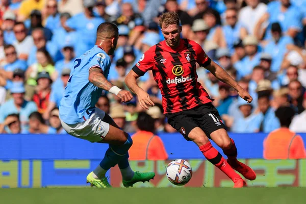 Jack Stacey #17 of Bournemouth tries to get past Kyle Walker #2 of Manchester City 