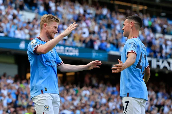 Kevin De Bruyne #17 of Manchester City celebrates with Phil Foden #47 of Manchester City after scoring to make it 2-0