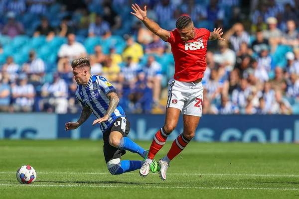 Ryan Inniss #24 of Charlton Athletic fouls Josh Windass #11 of Sheffield Wednesday