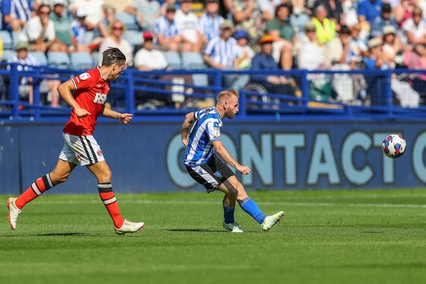 Barry Bannan #10 of Sheffield Wednesday passes the ball