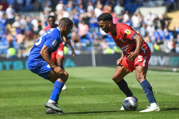 Auston Trusty #5 of Birmingham City  takes on Andy Rinomhota #35 of Cardiff City  