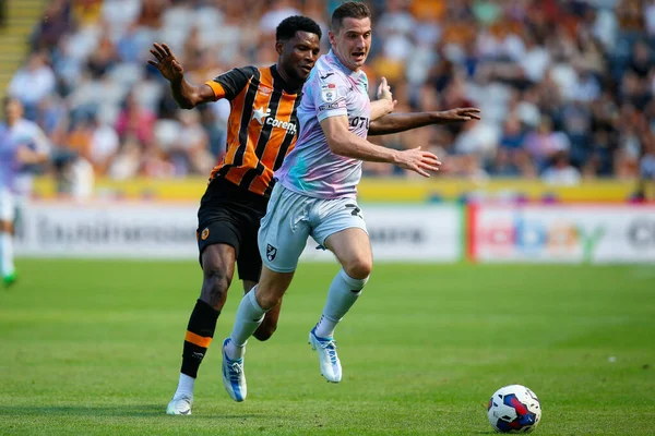 KennyMcLean #23 of Norwich City and Benjamin Tetteh #30 of Hull City  