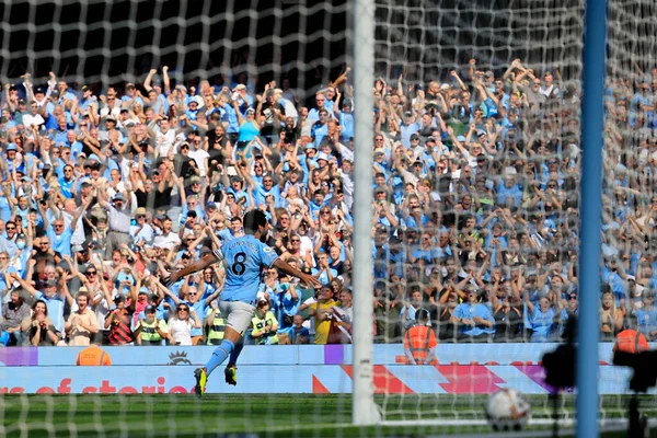 Ilkay Gundogan #8 of Manchester City scores to make it 1-0