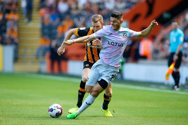 Milot Rashica #7 of Norwich City and Callum Elder #3 of Hull City 