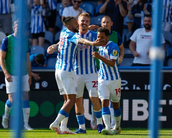 Sorba Thomas #7 of Huddersfield Town  celebrates with scorer of the second Town goal Danny Ward