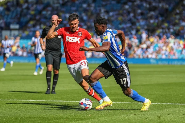 Fisayo Dele-Bashiru #17 of Sheffield Wednesday runs with the ball