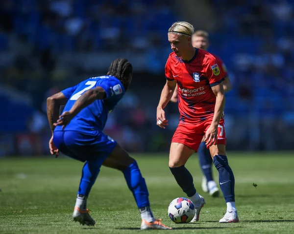 Przemys?aw P?acheta #17 of Birmingham City  takes on Mahlon Romeo #2 of Cardiff City  