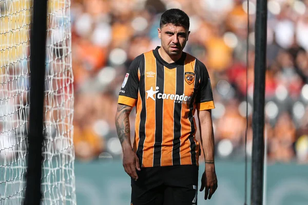 Ozan Tufan #7 of Hull City walks around the edge of the pitch after being substituted