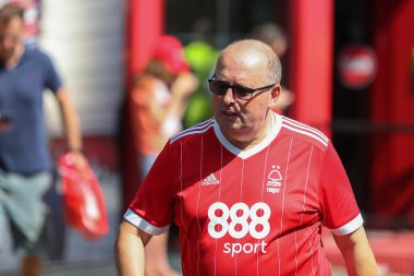 Nottingham Forest fans arrive at the City Ground for their first home Premier League game in 23 years