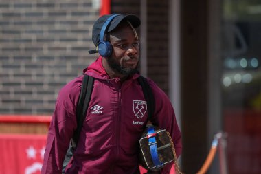 Maxwel Cornet #14 of West Ham United arrives at the game prior to kick off