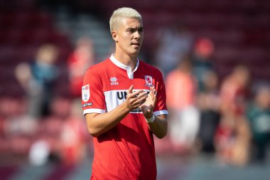 New signing and USA international Matthew Hoppe claps his hands and applauds the supporters at full-time 