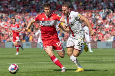 Paddy McNair #17 of Middlesbrough and Rhys Norrington-Davies #33 of Sheffield United battle for the ball during the second half 