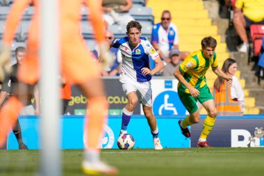 Tyler Morton #6 of Blackburn Rovers  break past Adam Reach #20 of West Bromwich Albion 