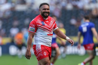 Konrad Hurrell #23 of St Helens smiles at fans as they chant his name