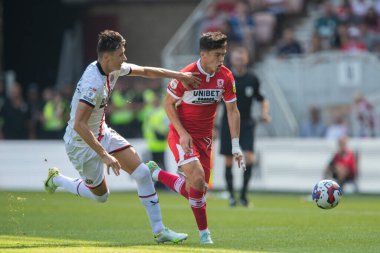 Ryan Giles #3 of Middlesbrough is tackled by Anel Ahmedhodi #15 of Sheffield United   