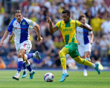 Grady Diangana #11 of West Bromwich Albion breaks past Callum Brittain #2 of Blackburn Rovers  