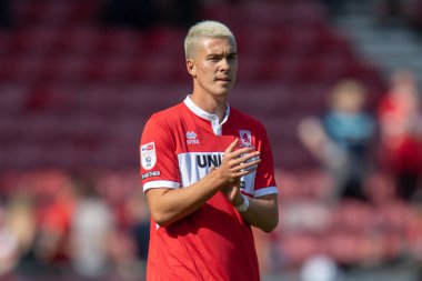 New signing and USA international Matthew Hoppe claps his hands and applauds the supporters at full-time 