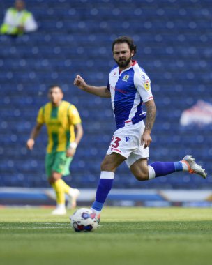 Bradley Dack #23 of Blackburn Rovers passes there ball