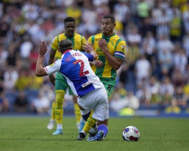Callum Brittain #2 of Blackburn Rovers  competes for the ball with Jake Livermore #8 of West Bromwich Albion 