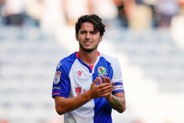 Lewis Travis #27 of Blackburn Rovers salutes the fans after the match which ended in a 2-1 victory