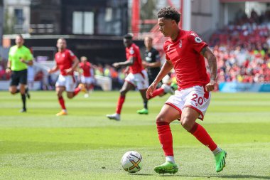 Brennan Johnson #20 of Nottingham Forest runs with the ball