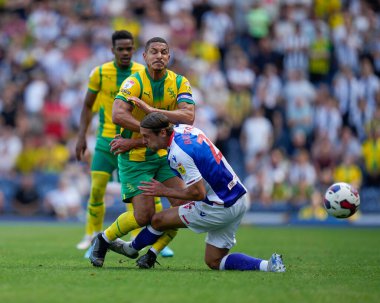 Callum Brittain #2 of Blackburn Rovers  competes for the ball with Jake Livermore #8 of West Bromwich Albion 