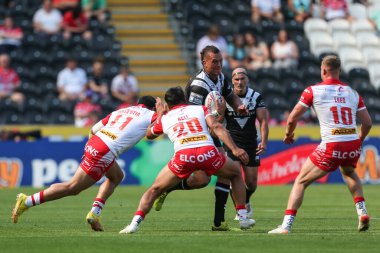 Kane Evans #16 of Hull FC runs at the St Helens defence