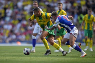 Jake Livermore #8 of West Bromwich Albion breaks past Sammie Szmodics #8 of Blackburn Rovers