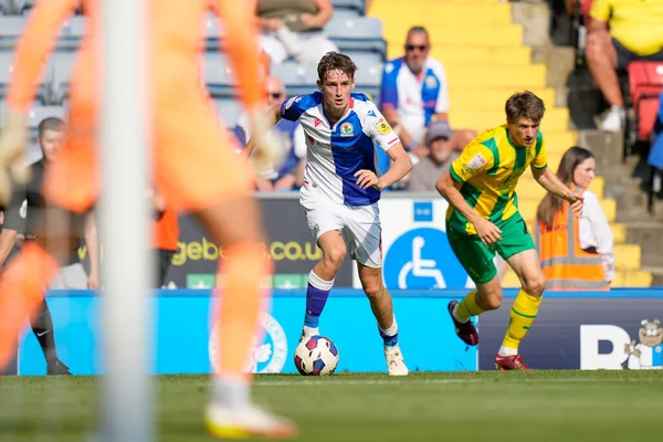Tyler Morton #6 of Blackburn Rovers  break past Adam Reach #20 of West Bromwich Albion 