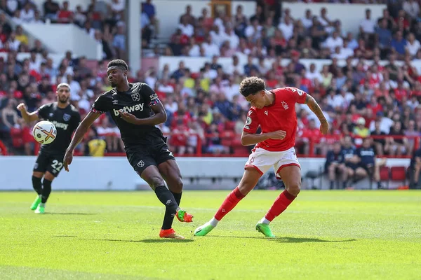 Brennan Johnson #20 of Nottingham Forest has a shot at goal