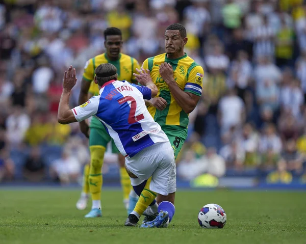 Callum Brittain #2 of Blackburn Rovers  competes for the ball with Jake Livermore #8 of West Bromwich Albion 