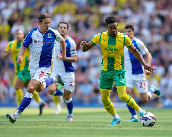 Grady Diangana #11 of West Bromwich Albion breaks past Callum Brittain #2 of Blackburn Rovers  
