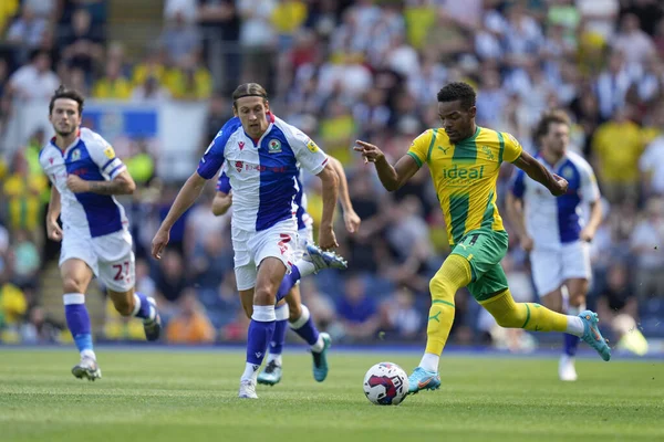 Grady Diangana #11 of West Bromwich Albion breaks past Callum Brittain #2 of Blackburn Rovers  
