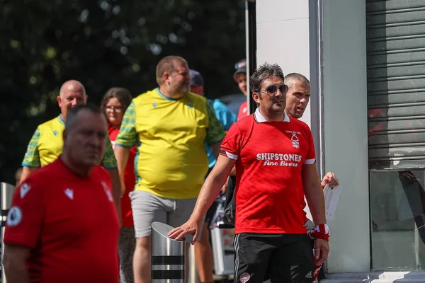 Nottingham Forest fans arrive at the City Ground for their first home Premier League game in 23 years