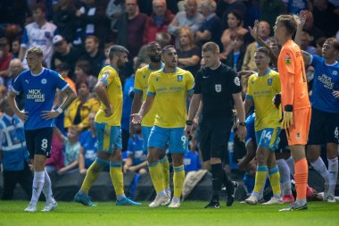 Lee Gregory #9 of Sheffield Wednesday protests to Referee James Oldham about the red card during the first half 