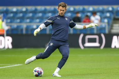 Chris Maxwell #1 of Blackpool during the warm up 