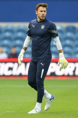 Chris Maxwell #1 of Blackpool during the warm up 