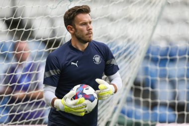 Chris Maxwell #1 of Blackpool during the warm up 