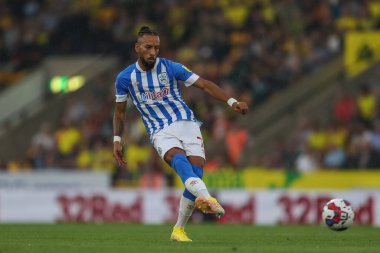 Sorba Thomas #7 of Huddersfield Town passes the ball