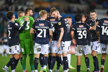 Millwall celebrates at the end of the game following a late equaliser.