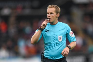 Referee Gavin Ward during the game