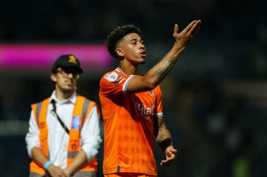 Jordan Lawrence-Gabriel #4 of Blackpool blows a kiss to the travelling fans 
