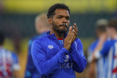 Duane Holmes #19 of Huddersfield Town applauds the travelling fans after their 2-1 loss