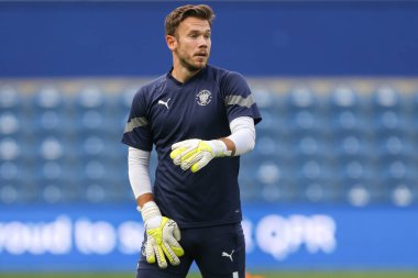 Chris Maxwell #1 of Blackpool during the warm up 