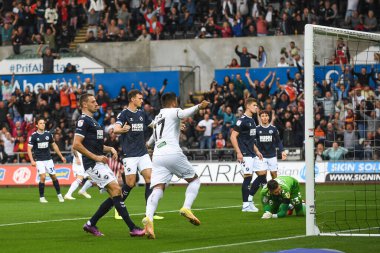Jol Piroe #17 of Swansea City celebrates Ryan Manning #3 of Swansea City goal to make it 1-0 