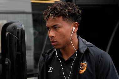 Vaughn Covil #49 of Hull City arrives at the stadium before the game