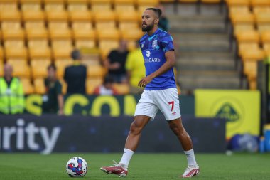 Sorba Thomas #7 of Huddersfield Town warms up ahead of kick off